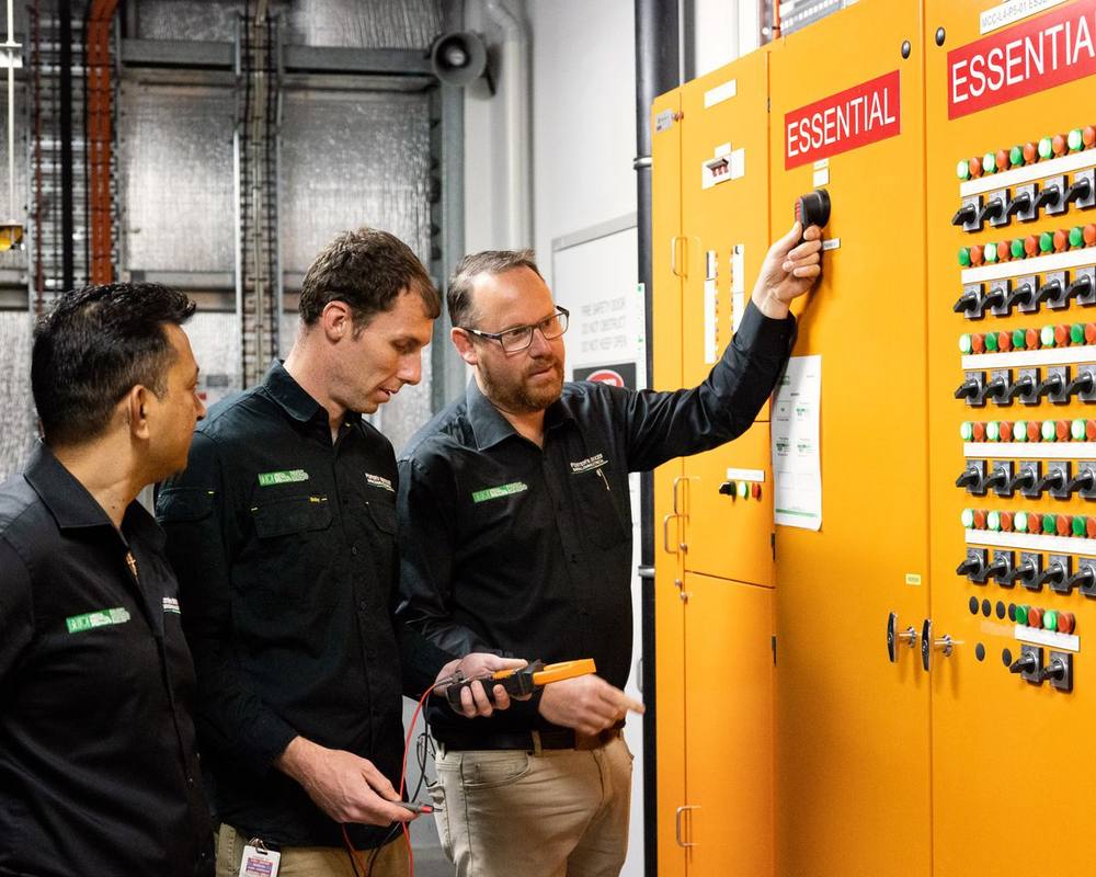Foster’s electricians working on an essential services switchboard